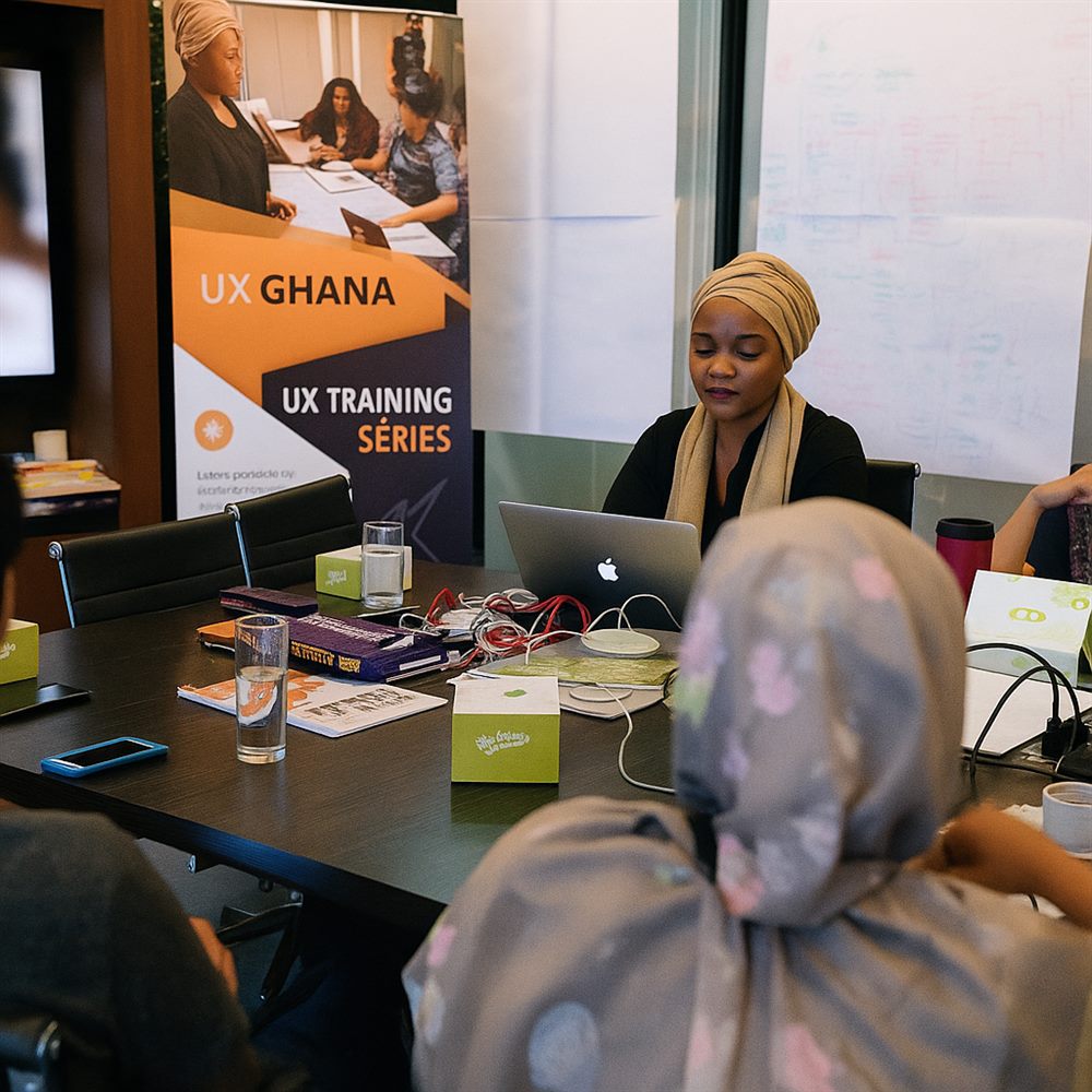 Participants at a hands-on IT and design training session